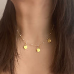 Cargar imagen en el visor de la galería, collar color oro de corazones
